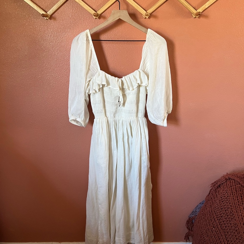 Elegant Cream Dress with Ruffle Detail